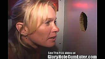 A Seductive Mature Woman Engages In Unprotected Anal Intercourse In A Gloryhole, Receiving Multiple Ejaculations Orally