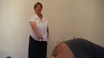 Mature Woman Punishes Her Submissive Man With A Strapon